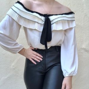 CeCe off the shoulder ivory x black ruffle top